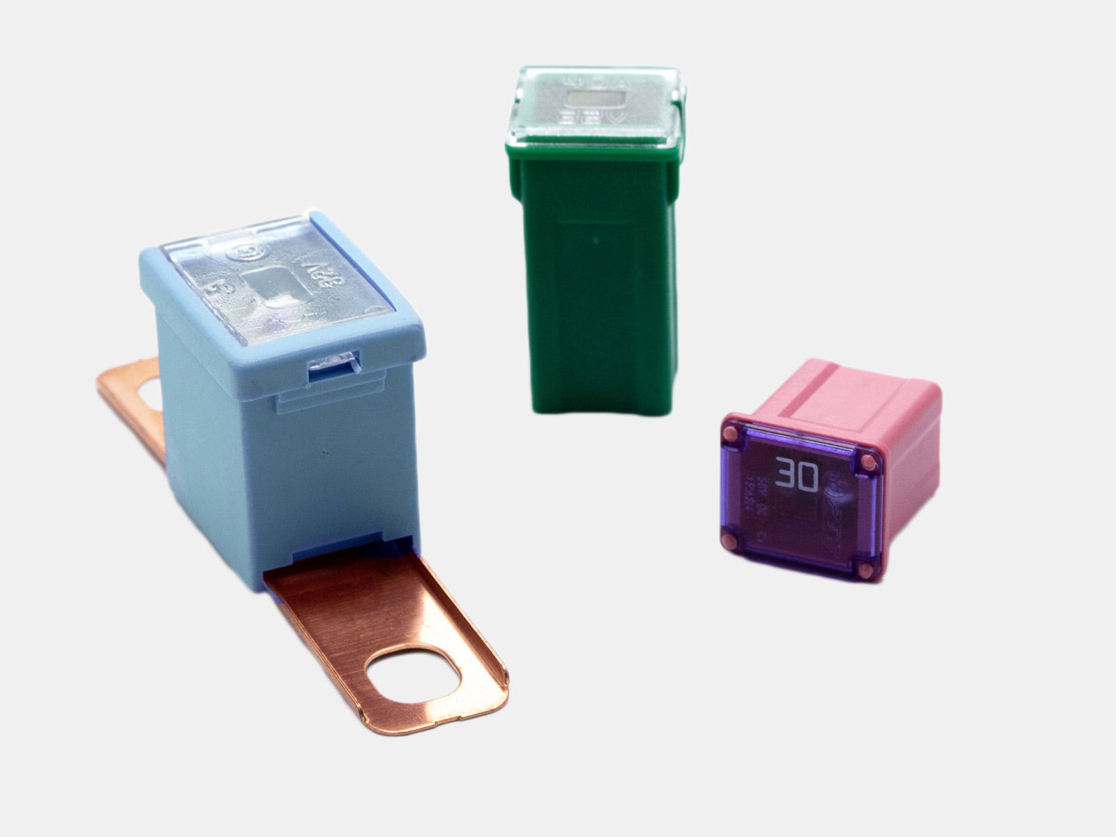 Automotive link fuses including PAL, JCASE, and MCASE types, highlighting designs for high-current circuit protection.